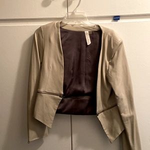 Polyester cream jacket with padded sleeves size medium